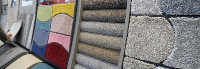 A close up shot of carpet stands, including coloured and grey ranges arranged interestingly.